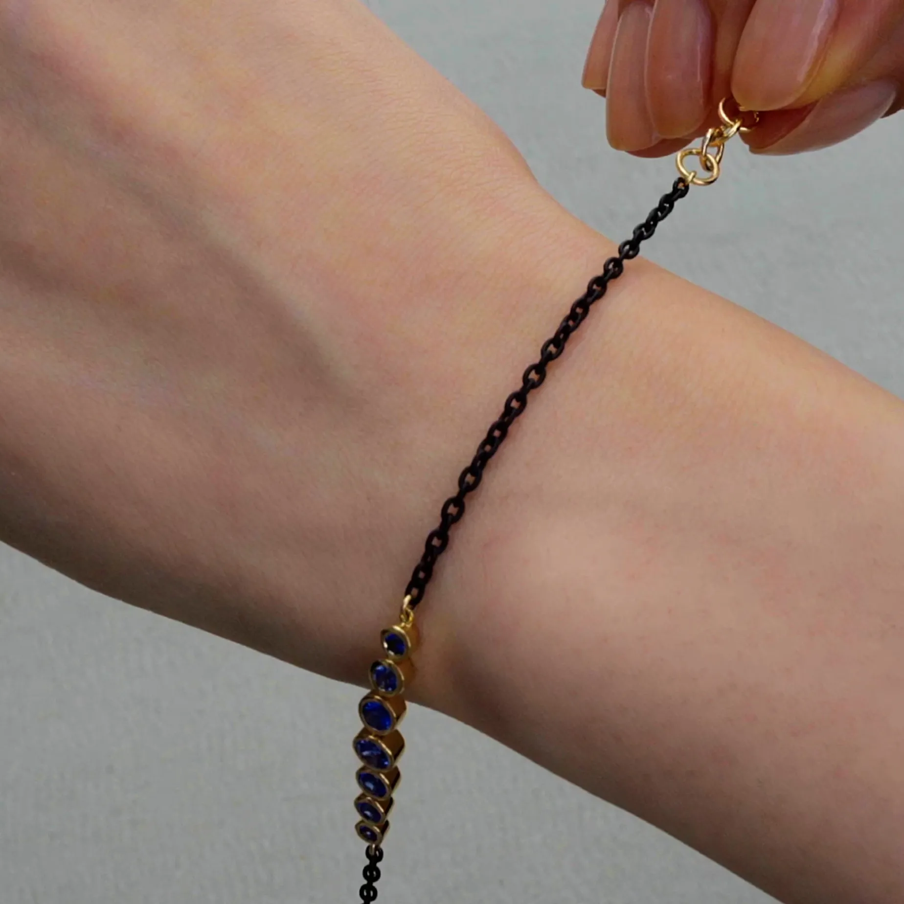 Bezel Set Round Blue Sapphire and Black Steel Tennis Bracelet