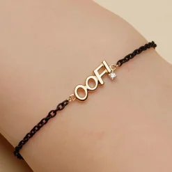 18K Gold and Black Steel “OOF” Bracelet